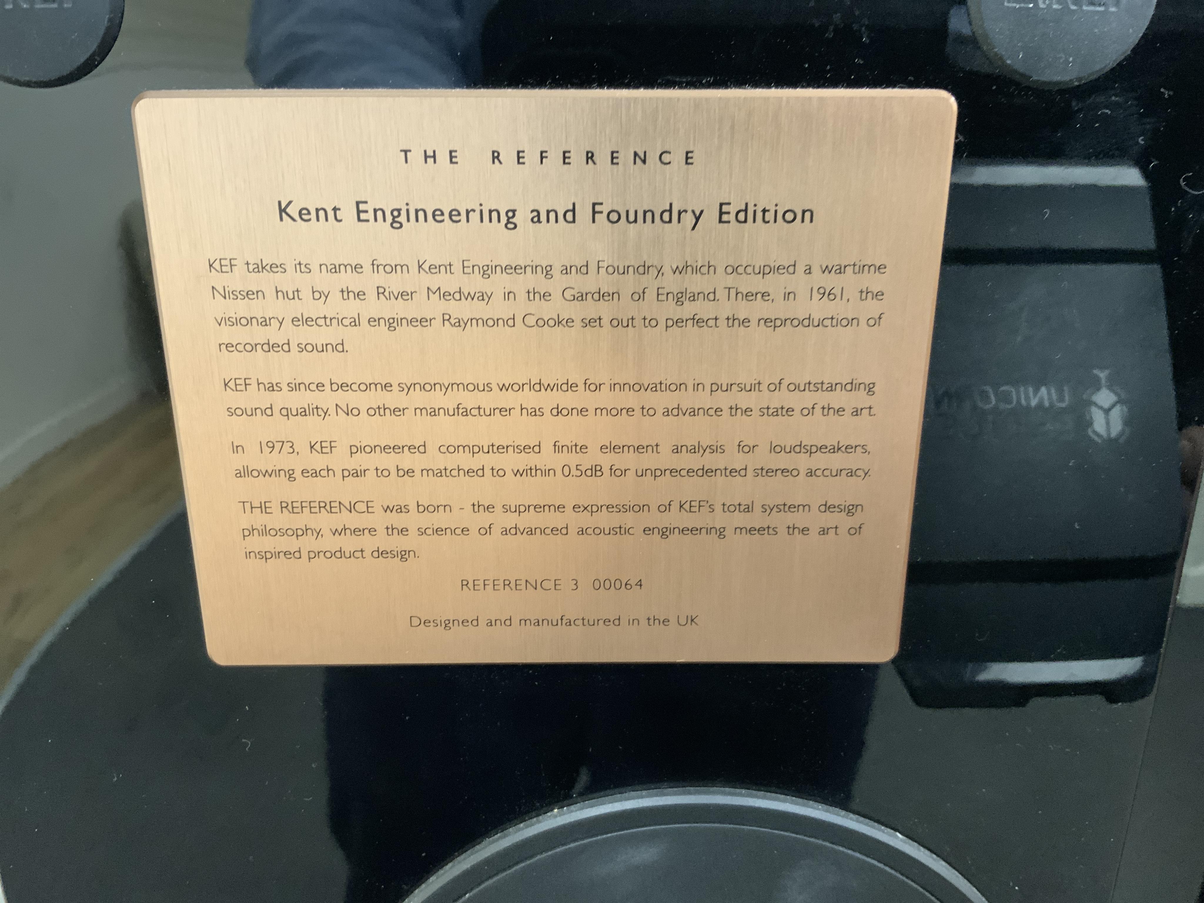A pair of flooring standing limited edition KEF Reference 3 stereo speakers, the ‘Foundry Edition’, finished in gloss black with copper speaker surrounds on the centre speakers and copper finished plaque to the reverse c